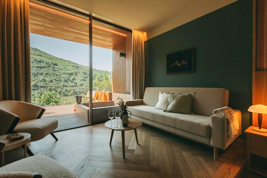 Douro Valley Port Wines: A Portugal Wine Region Guide An elegant sitting room with views over the Douro Valley in a high end hotel