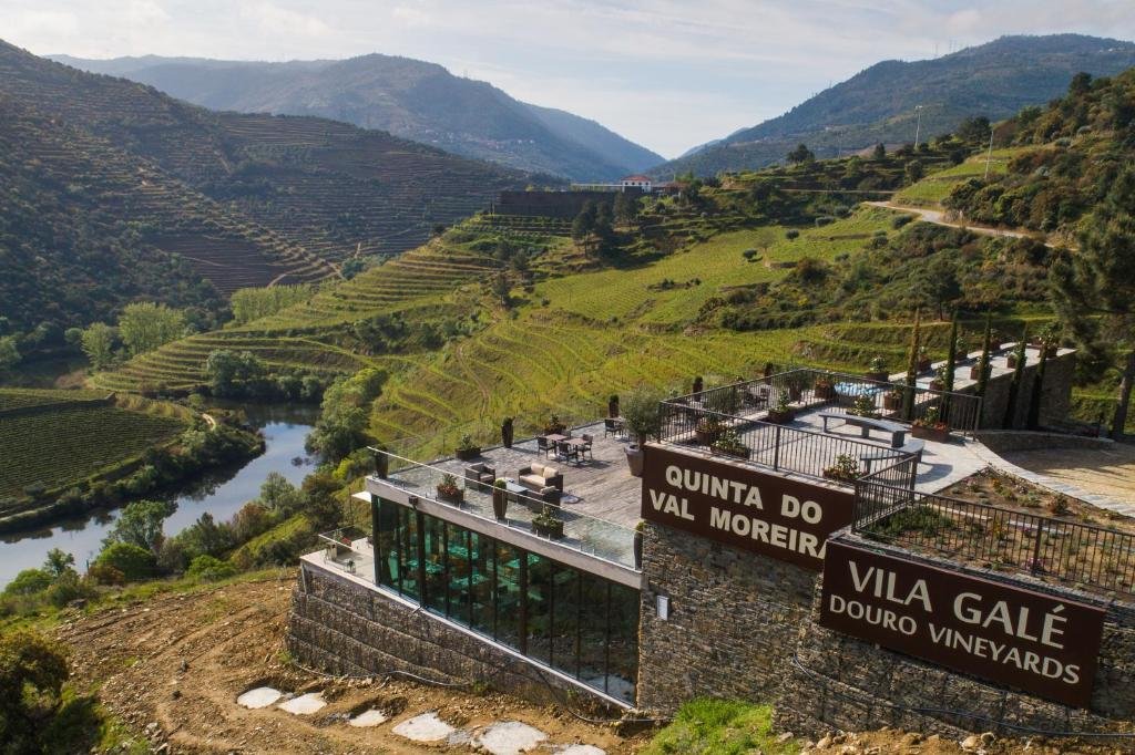 Douro Valley Port Wines: A Portugal Wine Region Guide Aerial view of the terrace and tasting room of a beautiful Quinta