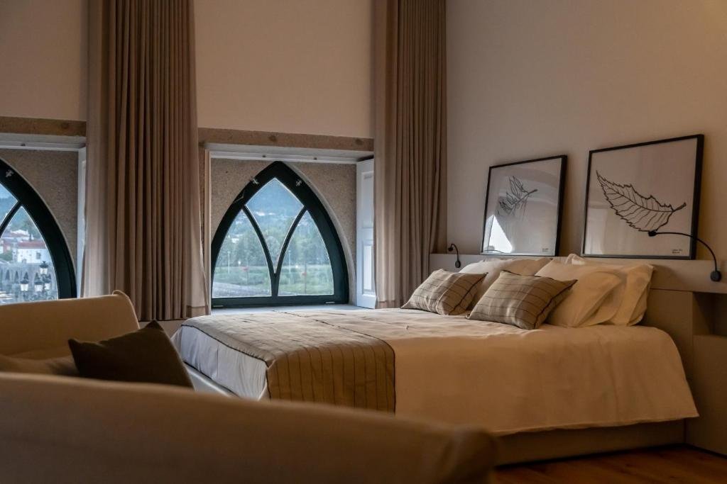 Best Towns in Northern Portugal: A Photographer’s Map camoes apartments ponte de lima historic gothic bedroom.jpg