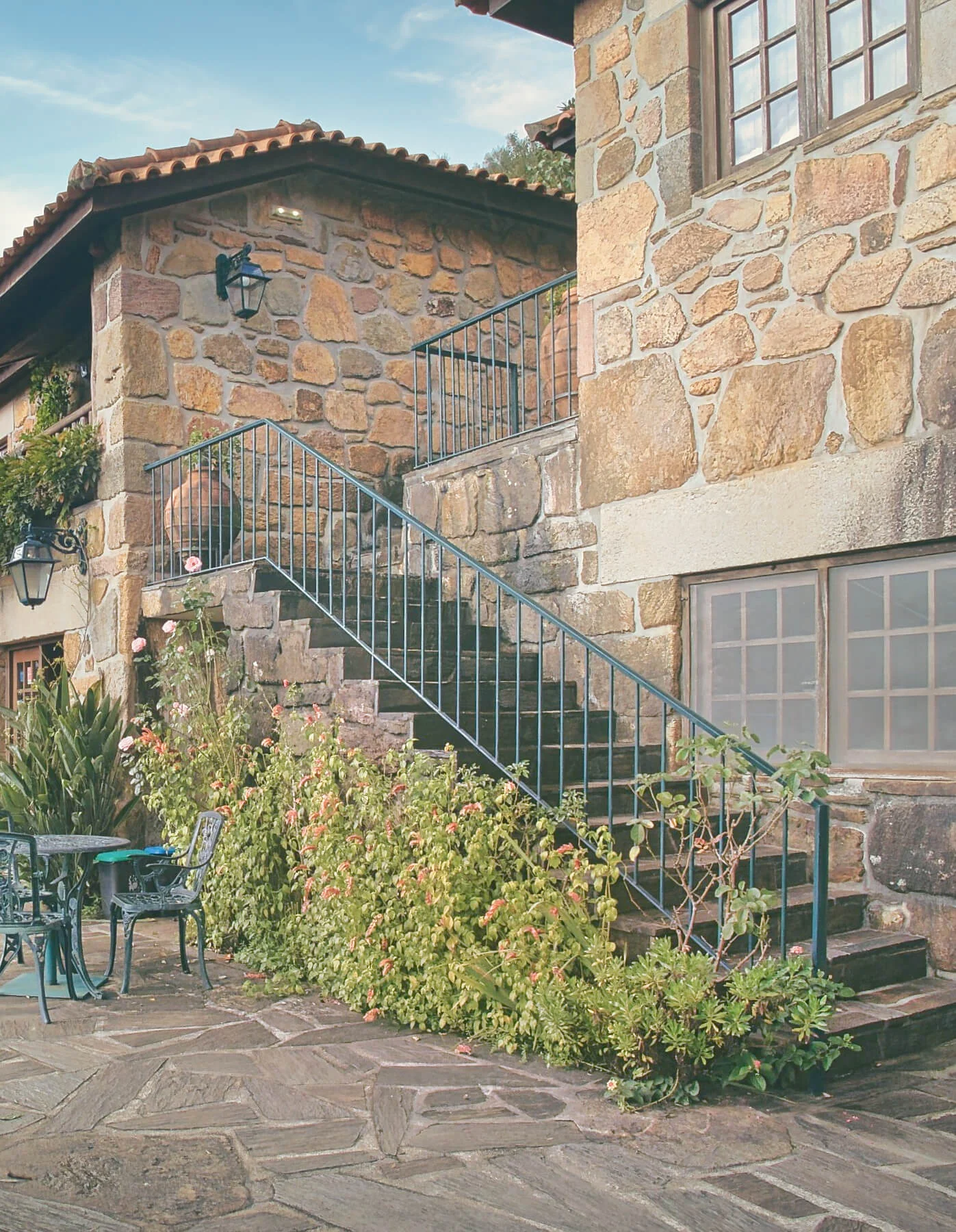 A traditional stone house with external stone stairs in the Douro Valley region of northern Portugal showcasing regional architectural heritage